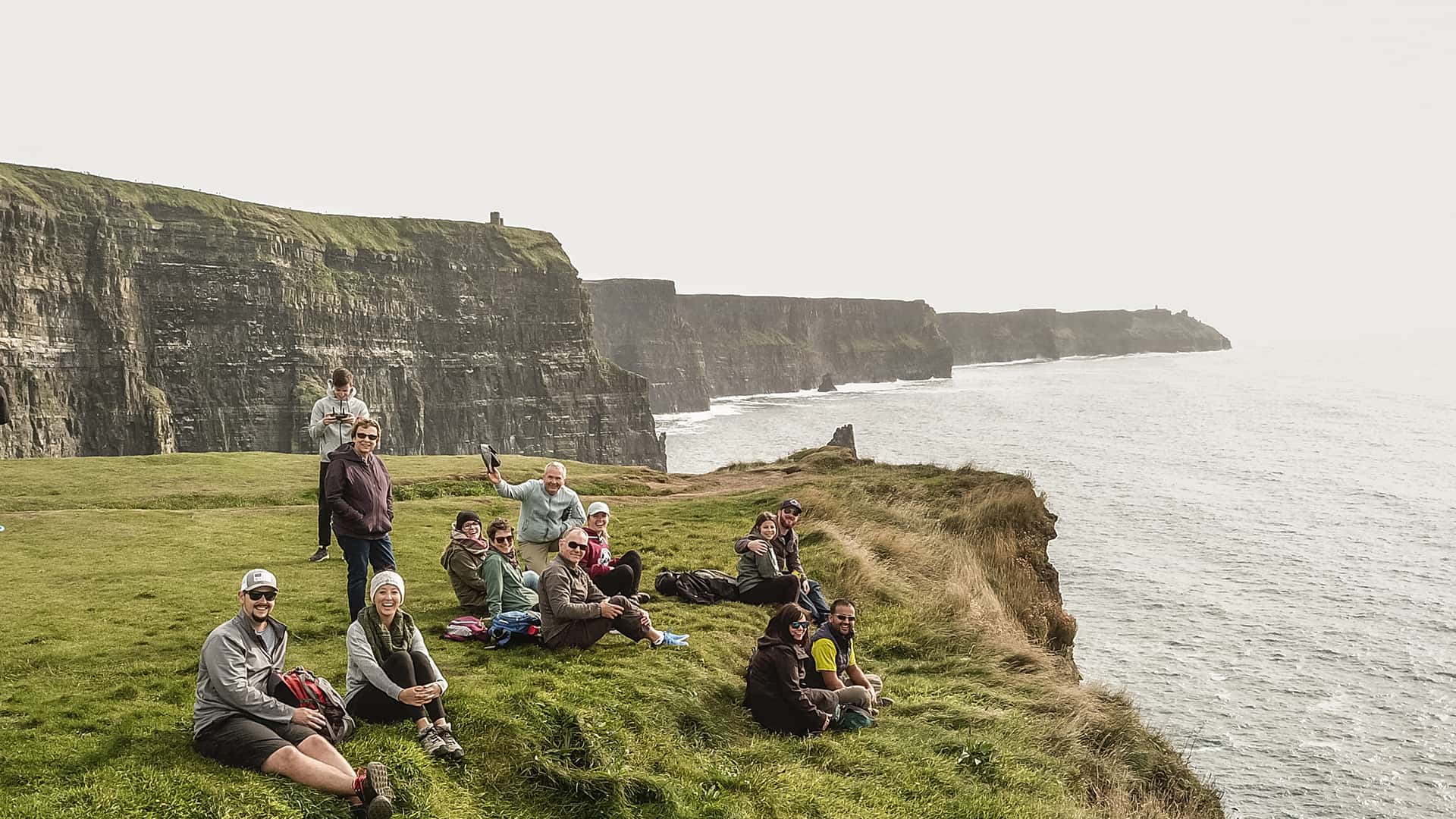 Group Chilling on Cliffs Photo
