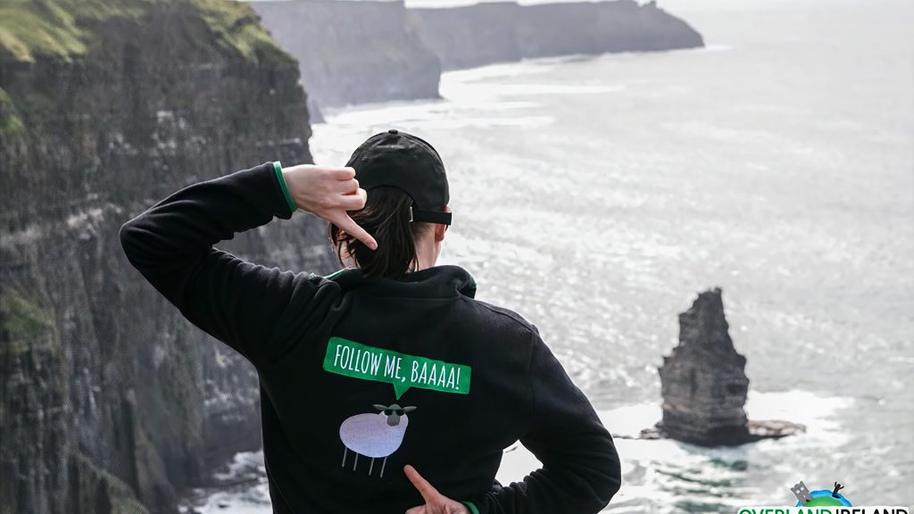guide standing with back with Overland Ireland sweatshirt