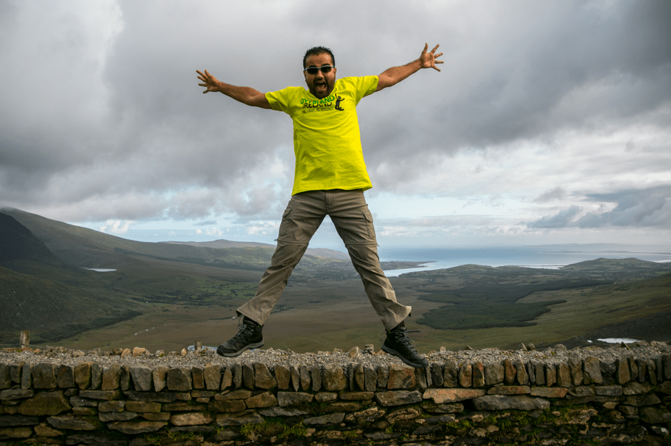 A man jumping on a wall in Ireland